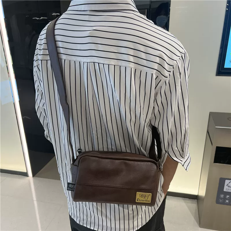 Ba hộp túi vuông nhỏ thời trang dành cho nam, túi đeo chéo nhỏ một vai thương hiệu thời thượng Hàn Quốc và Nhật Bản, ba lô đeo chéo cổ điển giản dị dành cho nam và nữ.