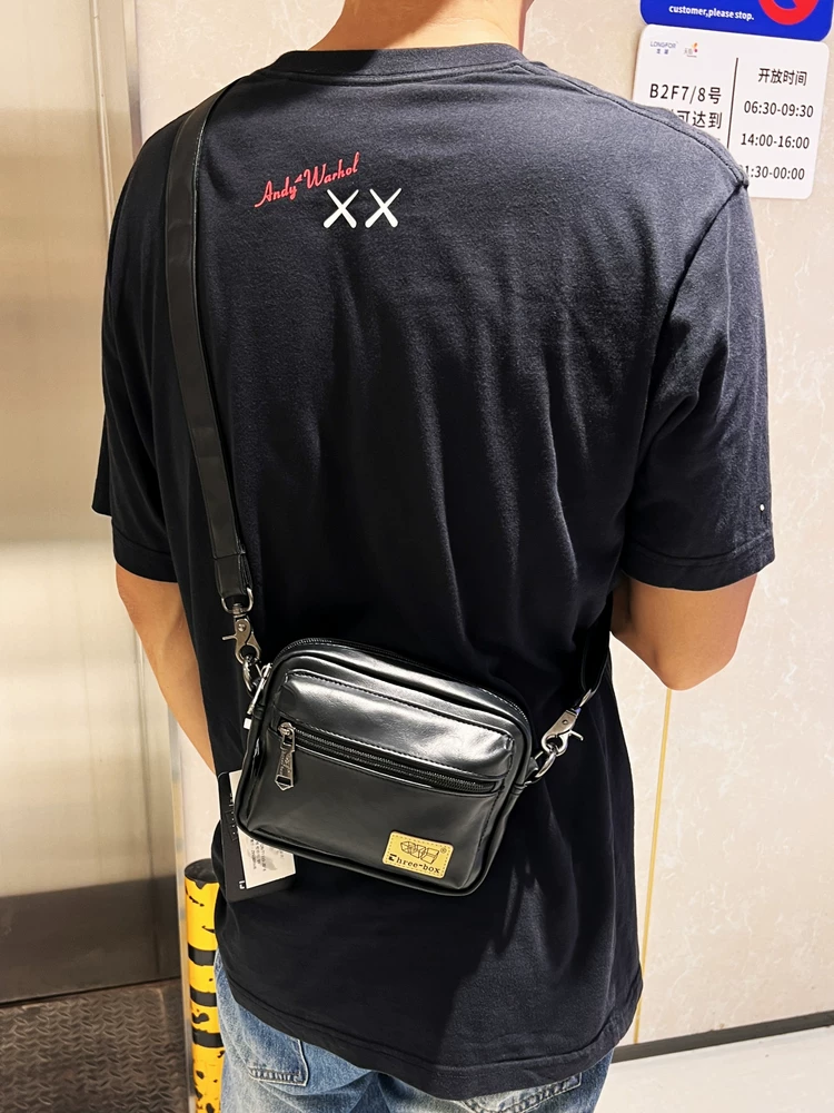 Túi xách nam thương hiệu mới hợp thời trang Túi đeo vai nam phong cách Nhật Bản và Hàn Quốc Túi đeo chéo thông thường Túi đeo chéo ngoài trời điện thoại di động Ba lô nhỏ Túi đi làm bằng da mềm