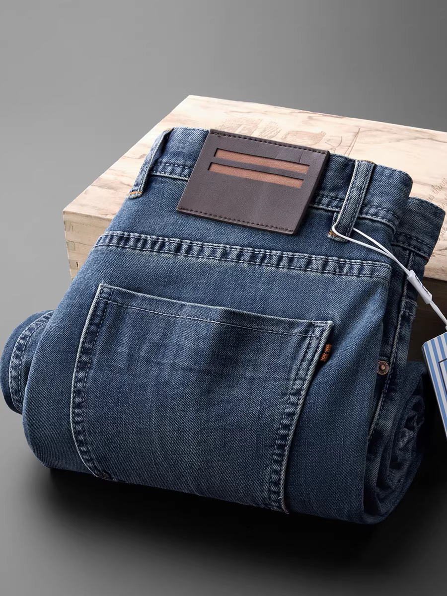 Quần jean cotton màu xanh đã qua xử lý vintage mới cho mùa xuân và mùa hè dành cho nam, quần dài dáng thẳng đa năng, hơi rộng, co giãn, mềm mại và thoáng khí.