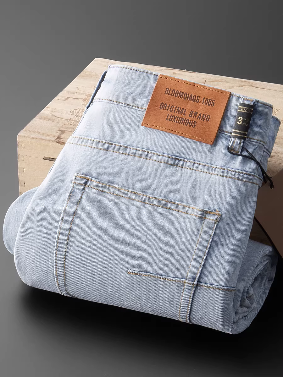 Mùa xuân và mùa hè phong cách mới quần jean cotton siêu mềm dành cho nam quần denim ống thẳng được giặt đa năng màu xanh nhạt co giãn thoáng khí mỏng