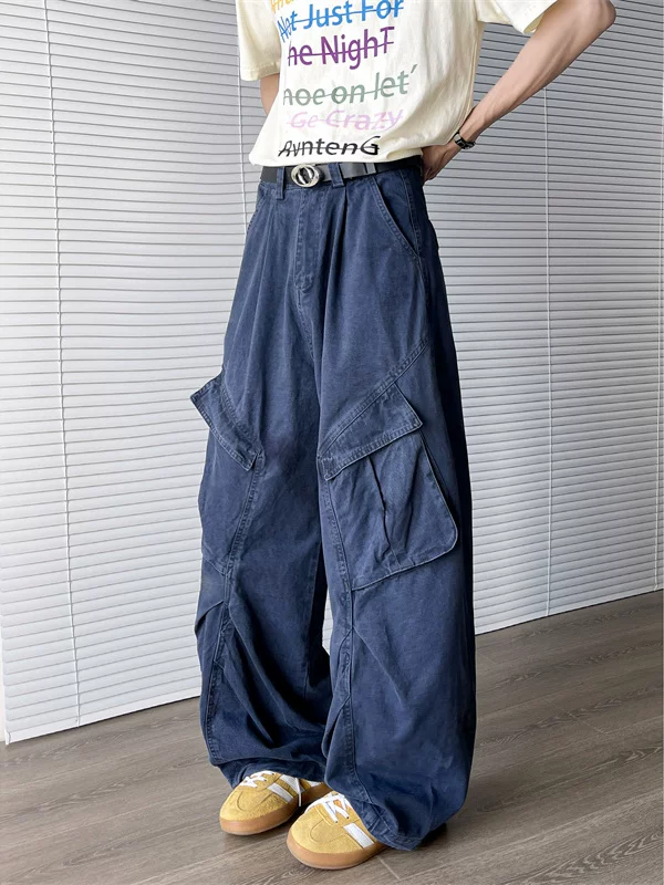 Quần jean nam dáng rộng thời trang, có túi bên hông lớn, quần công sở thiết kế phá cách theo phong cách retro Mỹ.
