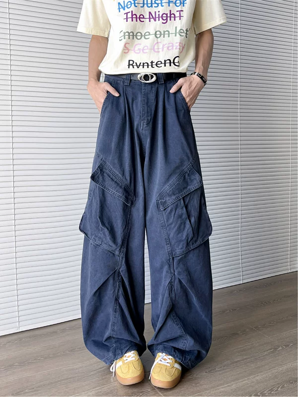 Quần jean nam dáng rộng thời trang, có túi bên hông lớn, quần công sở thiết kế phá cách theo phong cách retro Mỹ.