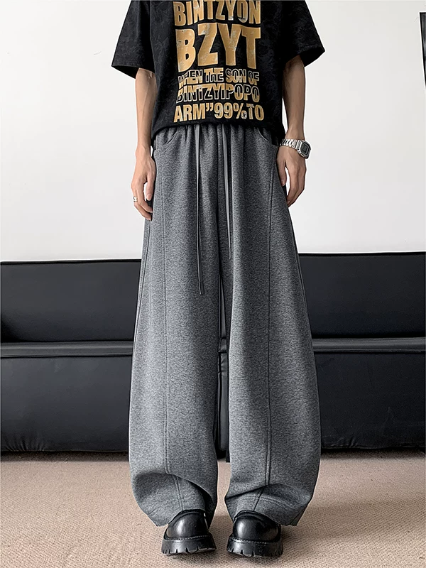 Quần thể thao ống rộng vạt cong dành cho nam, quần đôi phong cách hip-hop Mỹ mùa xuân thu, quần dài dáng rộng thoải mái, hợp thời trang, chất liệu mềm mại.