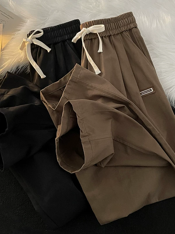 Quần nam phong cách Nhật Bản mùa xuân hè, quần ống đứng kiểu Mỹ retro, quần dài ống rộng thời trang, dáng suông rộng rãi.