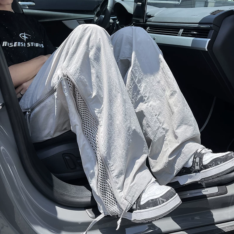 Quần dù lưới nhanh khô kiểu Mỹ dành cho nam, quần đi bộ đường dài ngoài trời rộng rãi, hợp thời trang, phong cách đường phố mùa hè.