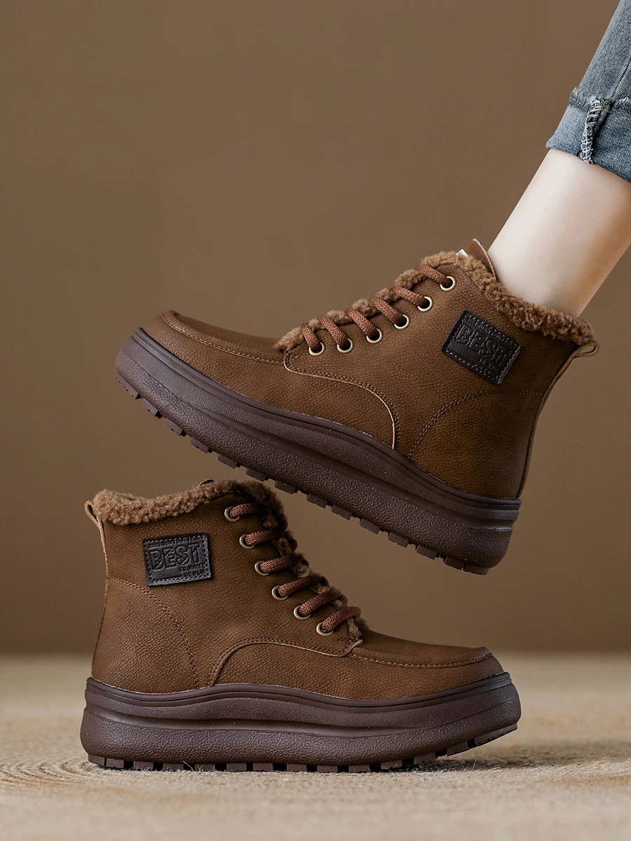 Giày bốt đi tuyết da thật cho nữ, đế dày, lót lông cừu, giày cotton cổ cao, kiểu mới mùa đông 2025, bốt Martin, bốt ngắn ấm áp phong cách thường ngày.
