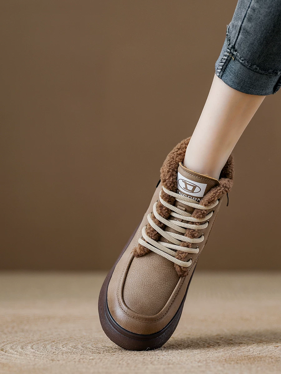 Giày bốt đi tuyết da thật cho nữ, đế dày, lót lông cừu, giày cotton cổ cao, kiểu mới mùa đông 2025, bốt Martin, bốt ngắn ấm áp phong cách thường ngày.