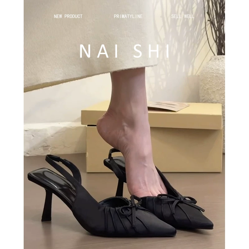 Phiên bản da cừu! Dép sandal nữ kiểu Pháp màu đen, mũi kín, có nơ, khoét bên, gót cao, giày mũi nhọn gợi cảm.