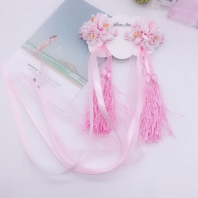 Kẹp tóc tua rua  cho bé cực kì dể thương